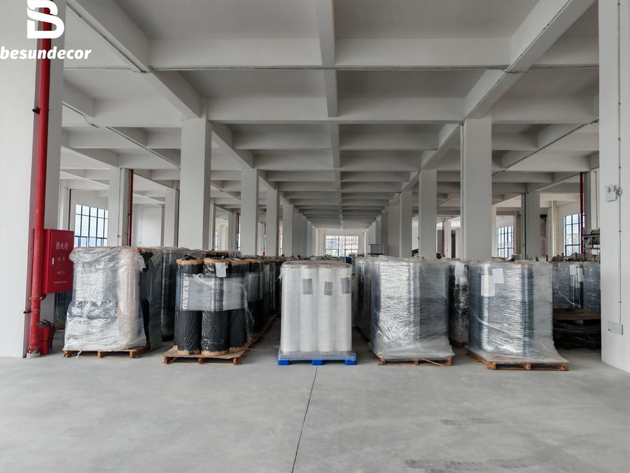 BESUN DECOR finished-goods warehouse with palletised rolls